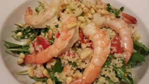 Minty Shrimp Couscous Salad served over a bed of Arugula and garnished with Toasted Pine Nuts (Photo Credit: Adroit Ideals)