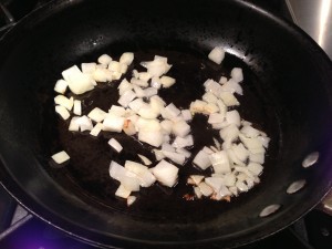 Saute your diced onions for the enchilada filling (Photo Credit: Adroit Ideals)