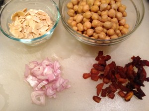 Toasted sliced almonds, canned chickpeas, sliced shallots, and dried apricots (Photo Credit: Adroit Ideals)