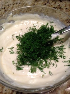 Chopped fresh dill mixes into plain Greek yogurt, Dijon mustard, mayonnaise, vinegar, and honey.  (Photo Credit: Adroit Ideals)