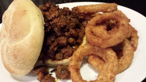 Super Sloppy Joe with Baked Onion Rings (Photo Credit: Adroit Ideals)