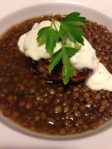 Grilled Lamb Burger served over a bed of Lentils and draped with Minty Yogurt Sauce (Photo Credit: Adroit Ideals)