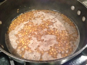 Simmer the lentils in chicken stock/broth and water until they are tender  (Photo Credit: Adroit Ideals)