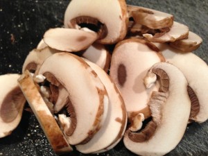Sliced cremini mushrooms (Photo Credit: Adroit Ideals)
