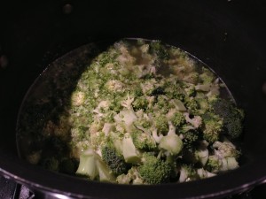 Add the chopped broccoli to the pan and saute with the onions for a few minutes (Photo Credit: Adroit Ideals)