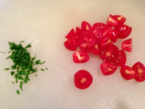 Chop chives and quarter some grape tomatoes (Photo Credit: Adroit Ideals)