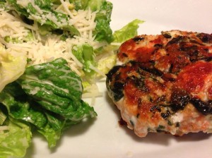 Salmon Burger with Spinach and Feta served with a Caesar Salad and my husband's Special Caesar Dressing.  (Photo Credit: Adroit Ideals)