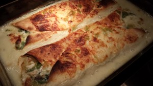 Baked Chicken and Spinach Enchiladas with Monterey Jack, Garlic, Sweet Onion and a Creamy Sauce (Photo Credit: Adroit Ideals)