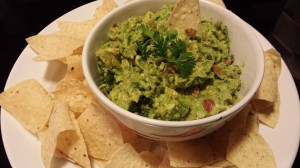 My favorite creamy Guacamole served with crispy Tortilla Chips (Photo Credit: Adroit Ideals)