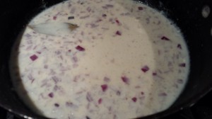 White sauce with bay leaf, paprika, and red onion (Photo Credit: Adroit Ideals)