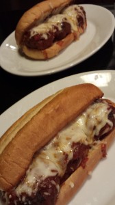 Hearty Meatball Subs with tomato bell pepper sauce and melty mozzarella cheese (Photo Credit: Adroit Ideals)