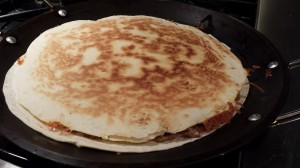 Be sure that the quesadilla browns on both sides (Photo Credit: Adroit Ideals)