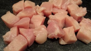 Cut the chicken into cubes  (Photo Credit: Adroit Ideals)