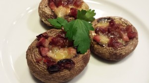 Stuffed Mushroom Caps with Brie, Ham and Dried Cranberries are a tasty bite-sized appetizer  (Photo Credit: Adroit Ideals)