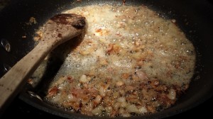 Lightly caramelize the shallots and garlic in the butter and oil (Photo Credit: Adroit Ideals)