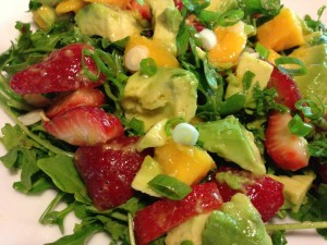 Strawberry, Mango and Avocado Salad over Arugula. Simple, tropical, and tasty. (Photo Credit: Adroit Ideals)