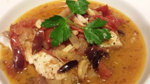 Rockfish Provencal -- white fish served with a sauce of tomatoes, kalamata olives, and roasted garlic (Photo Credit: Adroit Ideals)