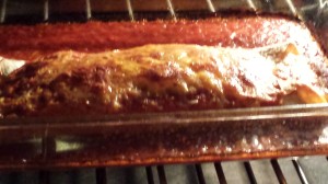 Cheese Enchilada with Homemade Red Enchilada Sauce is baking in the oven (Photo Credit: Adroit Ideals)