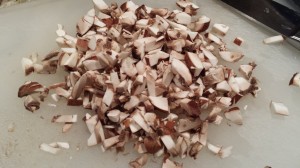 Finely chopped cremini mushrooms (Photo Credit: Adroit Ideals)