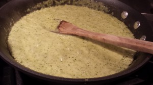 Simmering Creamy Basil Arugula Pesto sauce (Photo Credit: Adroit Ideals)