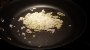 Saute the diced onions in oil (Photo Credit: Adroit Ideals)