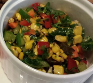 Colorful Chopped Salad with kale, tomatoes, roasted corn, carrots, celery, herbs, and more (Photo Credit: Adroit Ideals)