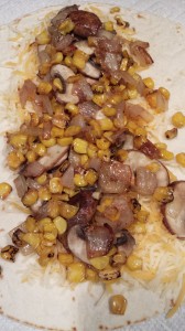 Roasted corn filling over shredded cheese  (Photo Credit: Adroit Ideals)