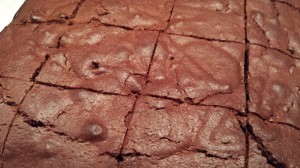 Slice the brownies into equal squares (Photo Credit: Adroit Ideals)