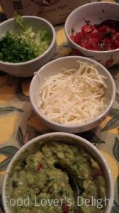 Taco Fixin's: Shredded Monterey Jack, Shredded Lettuce, Diced Tomato with Cilantro, and Guacamole (Photo Credit: Adroit Ideals)