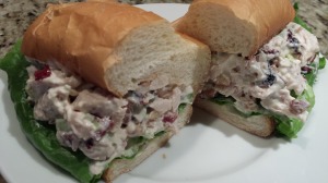 Tasty Chicken Salad with Dried Cranberries, Toasted Pecans, Celery, Scallions, Dijon and Mayo with Lettuce on a Toasted Roll (Photo Credit: Adroit Ideals)