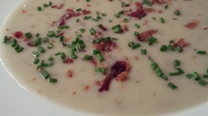 Crispy Bacon and Chives top Rustic Red Potato Soup.  Serve with Crusty Bread. (Photo Credit: Adroit Ideals)