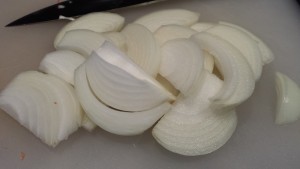 Slice some onions lengthwise  (Photo Credit: Adroit Ideals)
