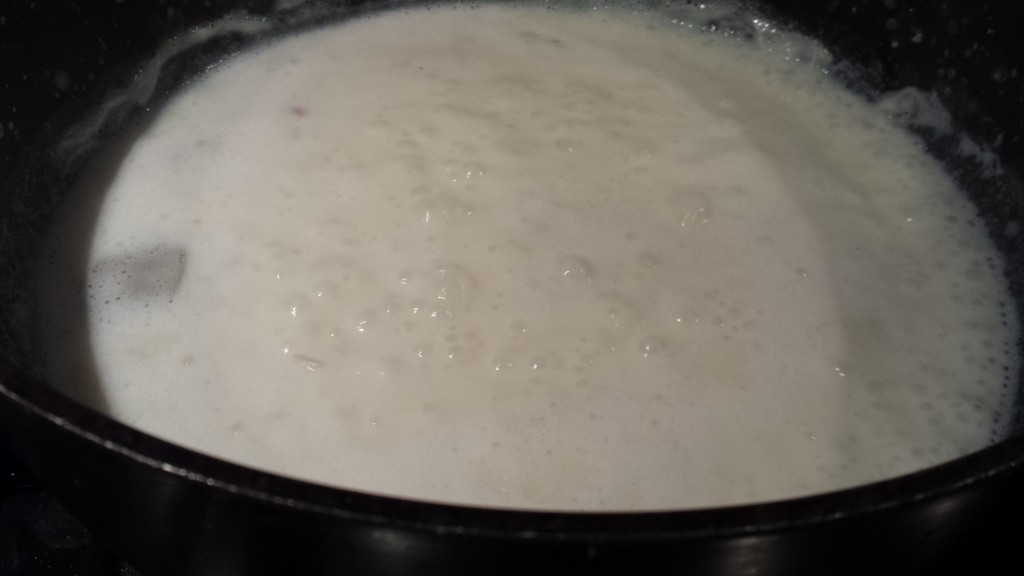 Simmer the white sauce until it thickens  (Photo Credit: Adroit Ideals)