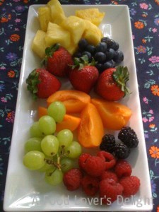 A colorful fresh fruit platter is a healthy option (Photo Credit: Adroit Ideals)
