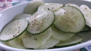 Simple Cucumber Salad with half peeled and half unpeeled cucumbers (Photo Credit: Adroit Ideals)