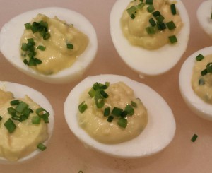 Deviled Eggs with colorful green chives (Photo Credit: Adroit Ideals)