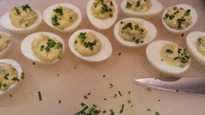 Fill the eggs and sprinkle on additional chives (Photo Credit: Adroit Ideals)