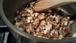 Saute diced mushrooms with diced onions in butter (Photo Credit: Adroit Ideals)