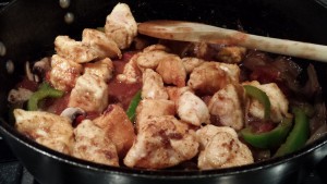 Add the browned chicken cubes (Photo Credit: Adroit Ideals)