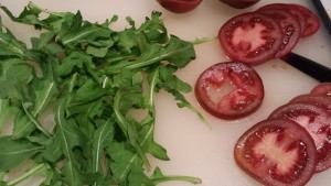 Fresh Arugula Leaves and Sliced Ripe Tomato (Photo Credit: Adroit Ideals)