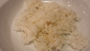 Divide the rice amongst the serving plates (Photo Credit: Adroit Ideals)