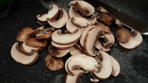 Sliced cremini mushrooms (Photo Credit: Adroit Ideals)