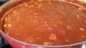 Let the chili simmer for at least one hour over low heat (Photo Credit: Adroit Ideals)