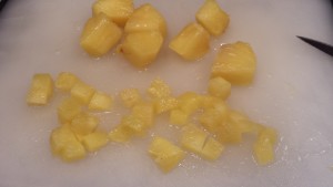 Dice pineapple into small pieces (Photo Credit: Adroit Ideals)