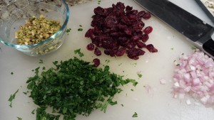 Chopped pistachios, parsley, and shallots along with dried cranberries (Photo Credit: Adroit Ideals)