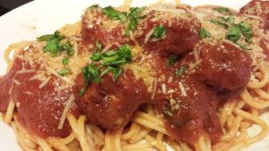 Easy Turkey Meatballs in Roasted Tomato Sauce served over Spaghetti (Photo Credit: Adroit Ideals)