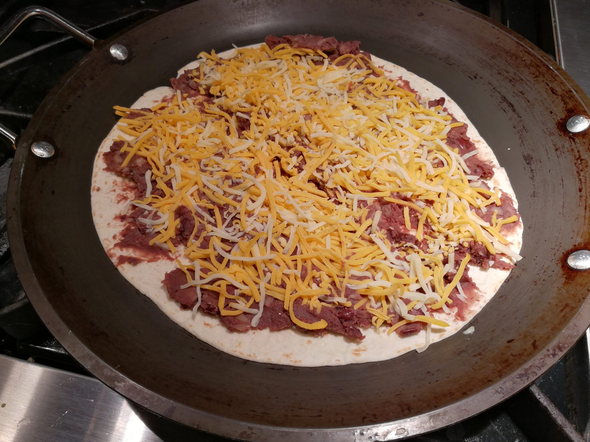 Melty Four Cheese Refried Bean Quesadilla A Food Lover’s Delight