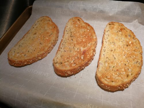 Three toasted bread slices