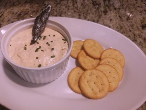 spread rich smoked salmon dip on crackers