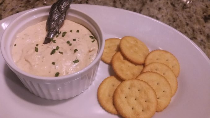 spread rich smoked salmon dip on crackers